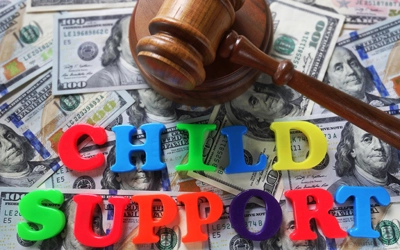 Gavel over pile of cash